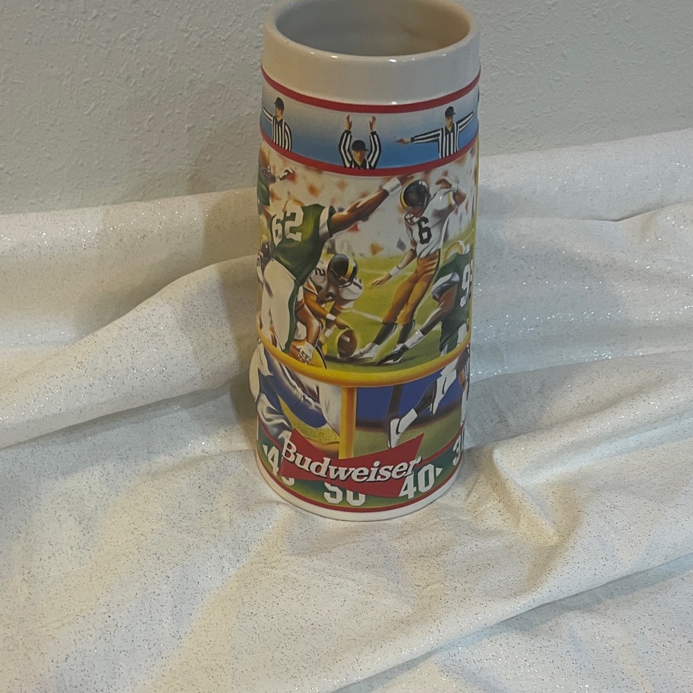 1997 Budweiser Sports Action Series "Touchdown" football beer stein.